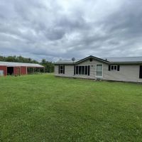 77 Acres With Home and Barns