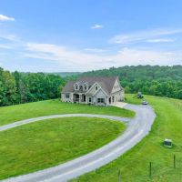 186 - Acres in Macon County Tennessee - Exquisite Farmhouse on Expansive Land images 3