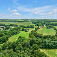 151.7 Acres in Macon County Tennessee - Charming Farmhouse on Expansive Cropland images 5