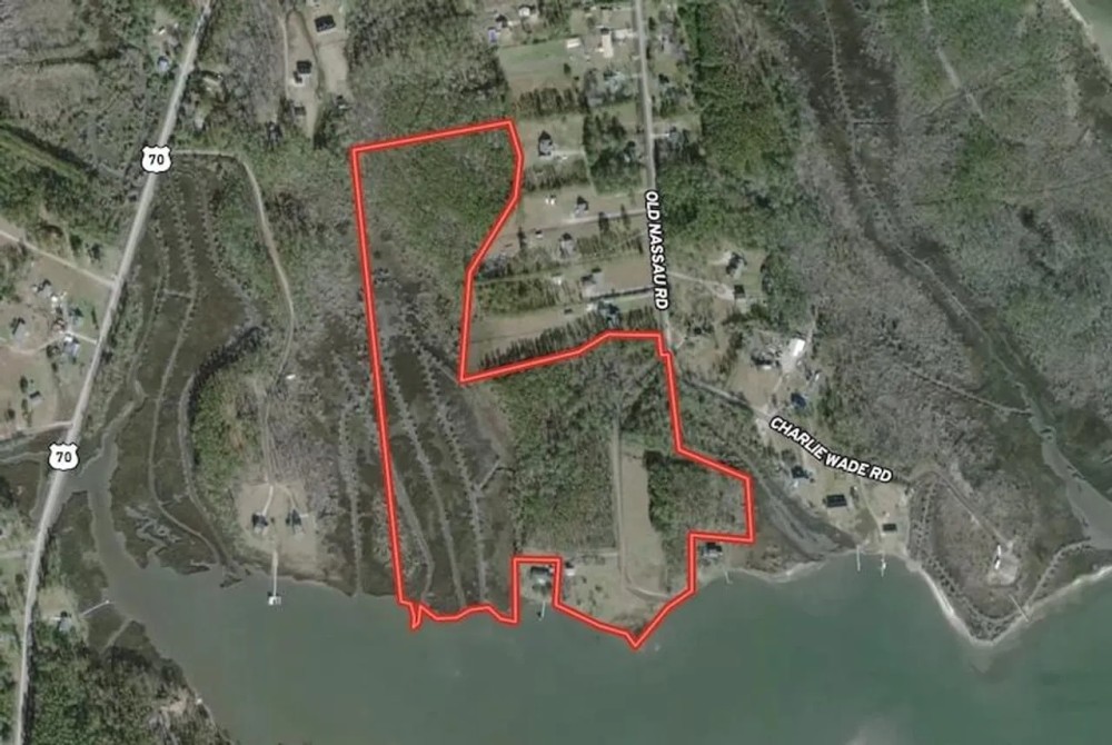 MARKET BASED PRICE IMPROVEMENT 42.62 Acres of Waterfront Land For