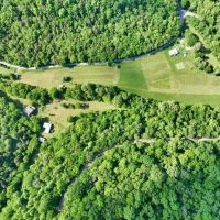 126.55 surveyed acres of excellent hunting recreational property with creek and rustic cabin located in Jackson County TN images 4