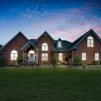 Custom 3 412 square ft brick home on 57.16 acres located in the heart of Macon County Tennessee