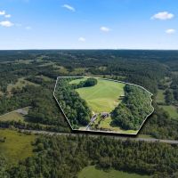 Custom 3 412 square ft brick home on 57.16 acres located in the heart of Macon County Tennessee images 2