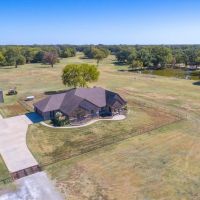 300 AC RANCH WITH STUNNING BRICK AND STONE HOME images 2
