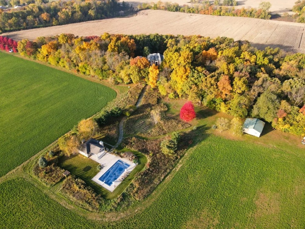 26201 Madison Rd North Liberty IN 46530 130 - acres 8 687 Sq Ft 7 Beds 4.5 Bath Pool House Pool Pond featured image
