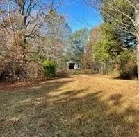 7 Acres with a Home in Tallahatchie County at 6283 Teasdale Road in Charleston MS images 5
