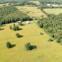 80.71 Acres Shouse Equipment Shed with Shop Private Setting Pond Texas County