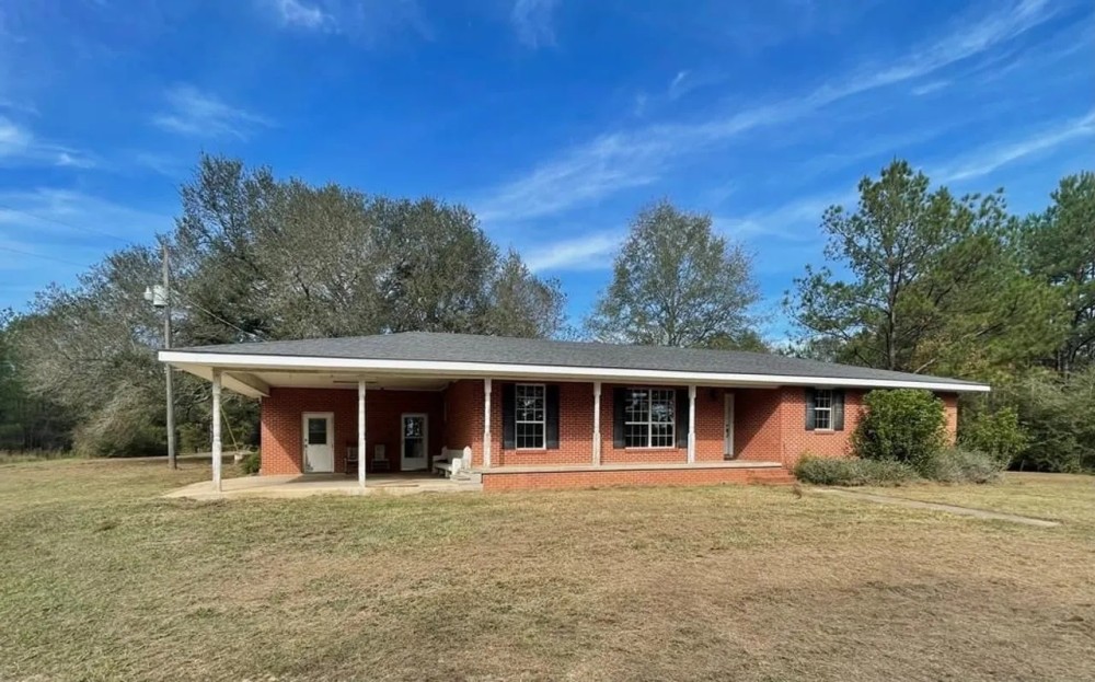 Home with Acreage For Sale in Sandy Hook MS featured image