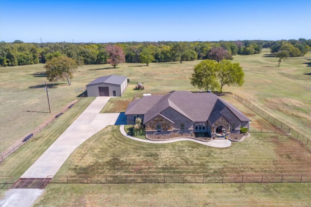 300 AC RANCH WITH STUNNING BRICK AND STONE HOME featured image