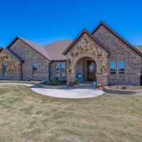 300 AC RANCH WITH STUNNING BRICK AND STONE HOME images 3