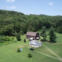 108 acres House with Barn in Port Crane NY