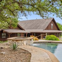 15.57 acres in Dripping Spring Custom Log Home Pool