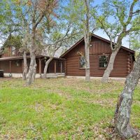 15.57 acres in Dripping Spring Custom Log Home Pool images 4