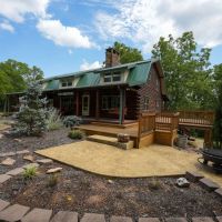 Handcrafted Log Home On Rolling Ozark Timberland Set Up For Great Hunting images 2