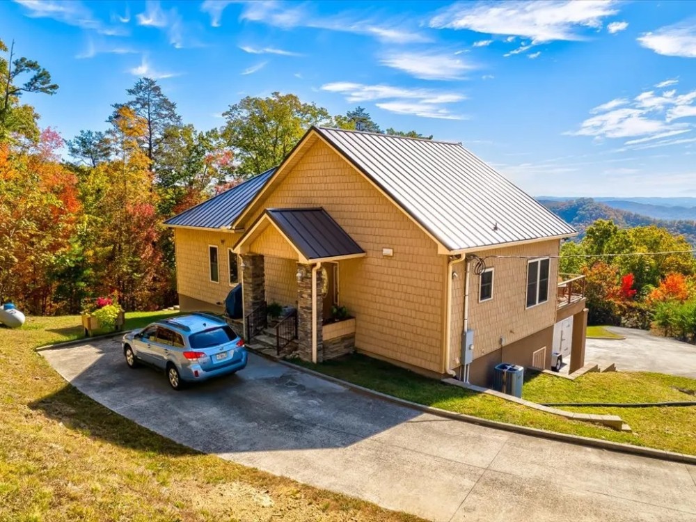 Breathtaking Lake Views From this Mountain Top Home featured image