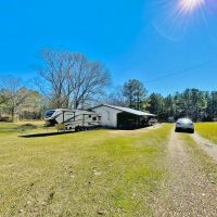 63 Wooded Acres with 2 Ponds and Home images 4