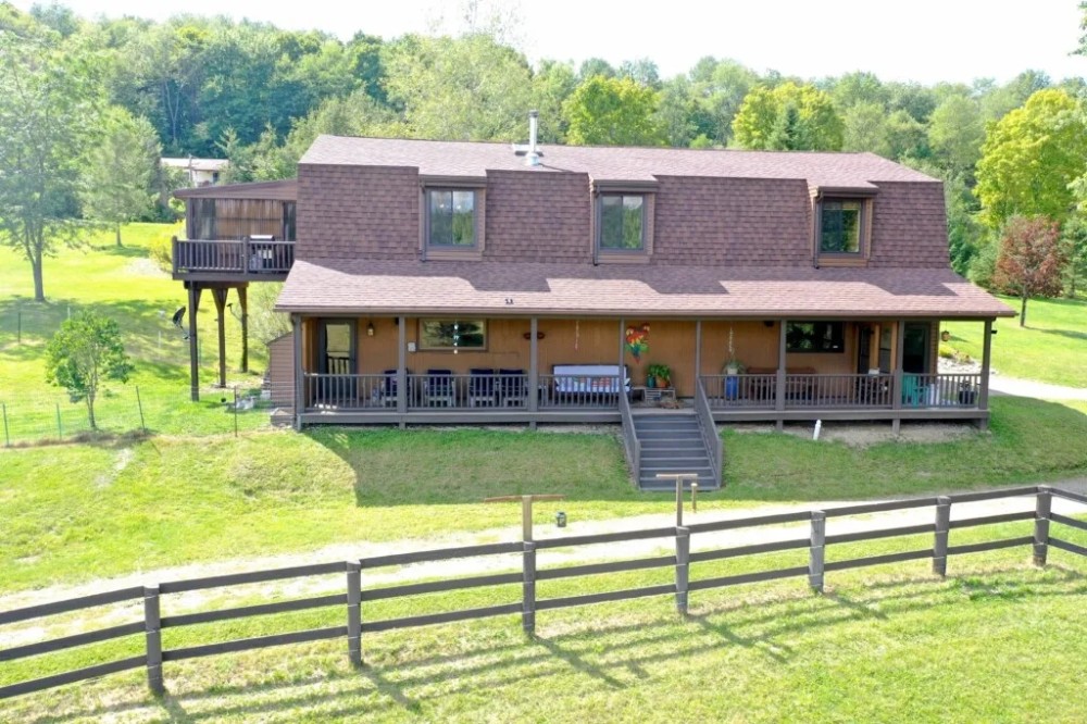 House with Barn Cottages and Ponds on 30 acres in Lyndon NY 6530 Abbotts Road featured image