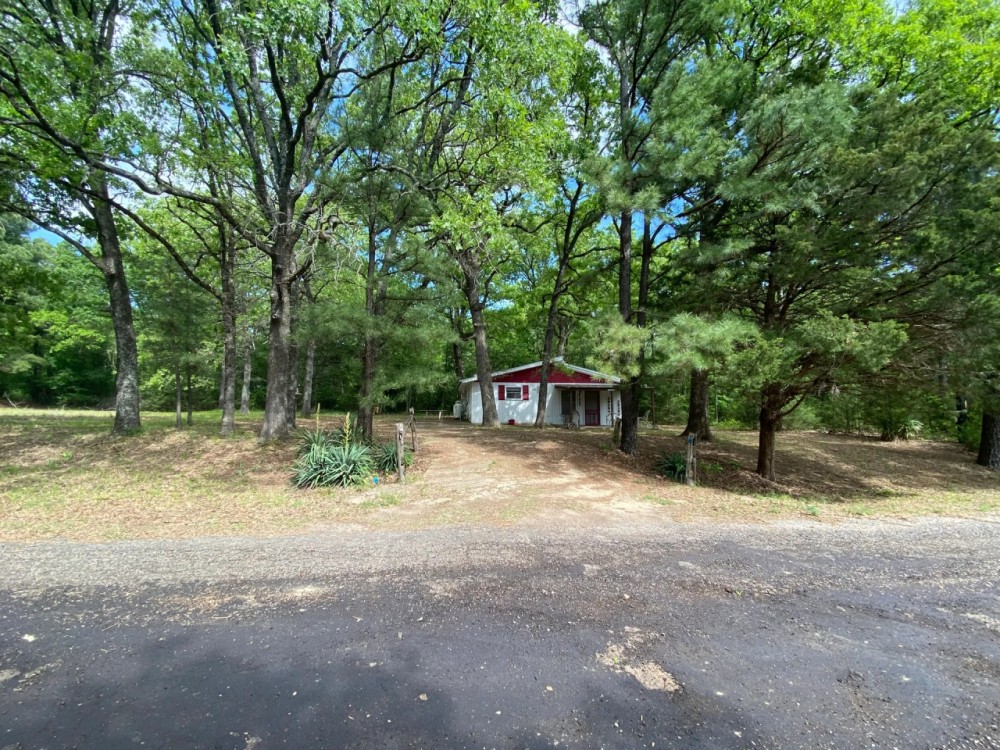 Recreational Land With Cabin For Sale Near Cooper Lake Klondike TX featured image