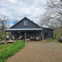 Mini Farm with 1955 Renovated home and Custom Survival Home on 51.45 Acres