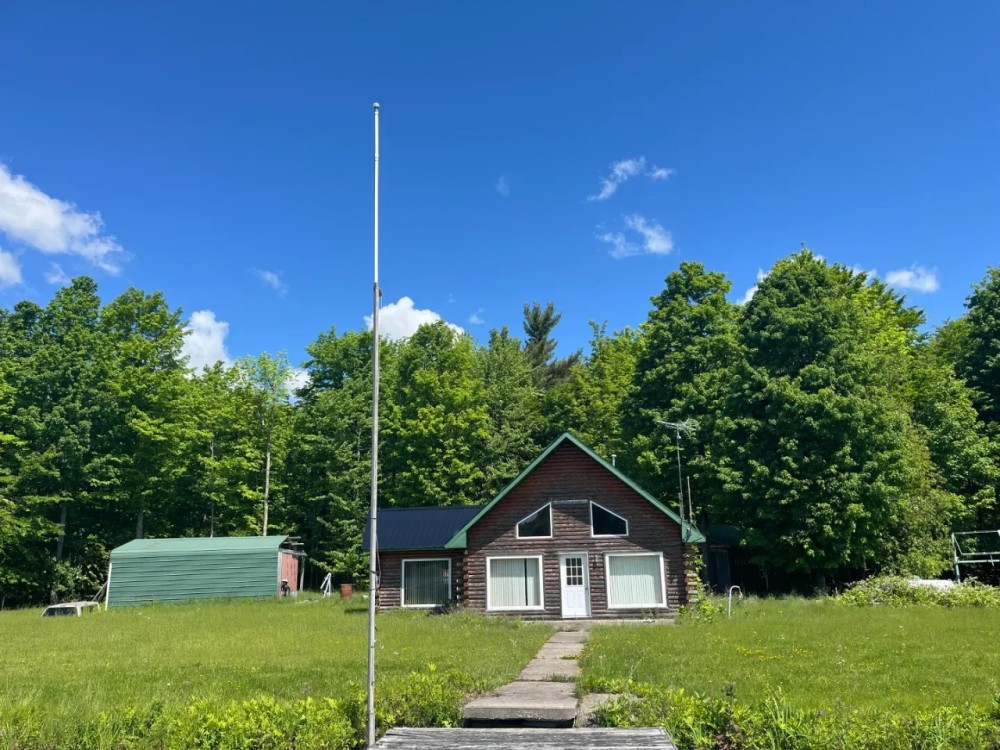 370 acre Estate with Cabin and Pond Hopkinton NY featured image