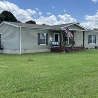 Countryside paradise with beautiful 3-bedroom 2-bathroom home nestled on 21.98 acres of prime land located in Macon County TN images 2