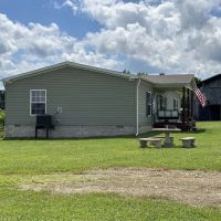 Countryside paradise with beautiful 3-bedroom 2-bathroom home nestled on 21.98 acres of prime land located in Macon County TN images 3