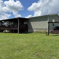Countryside paradise with beautiful 3-bedroom 2-bathroom home nestled on 21.98 acres of prime land located in Macon County TN images 5