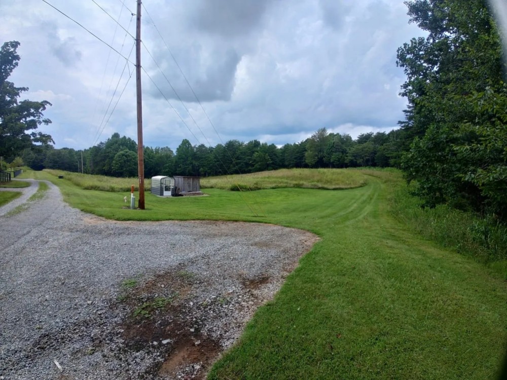 63 Acres Mostly Wooded Hunting Ground with Hidden Cave. featured image