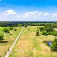 Nicely Updated House on Gated 45 Acres w 3 Outbuildings Long Driveway Interstate Frontage images 2