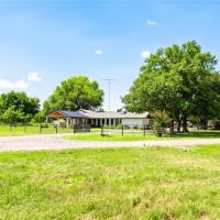 Nicely Updated House on Gated 45 Acres w 3 Outbuildings Long Driveway Interstate Frontage images 3