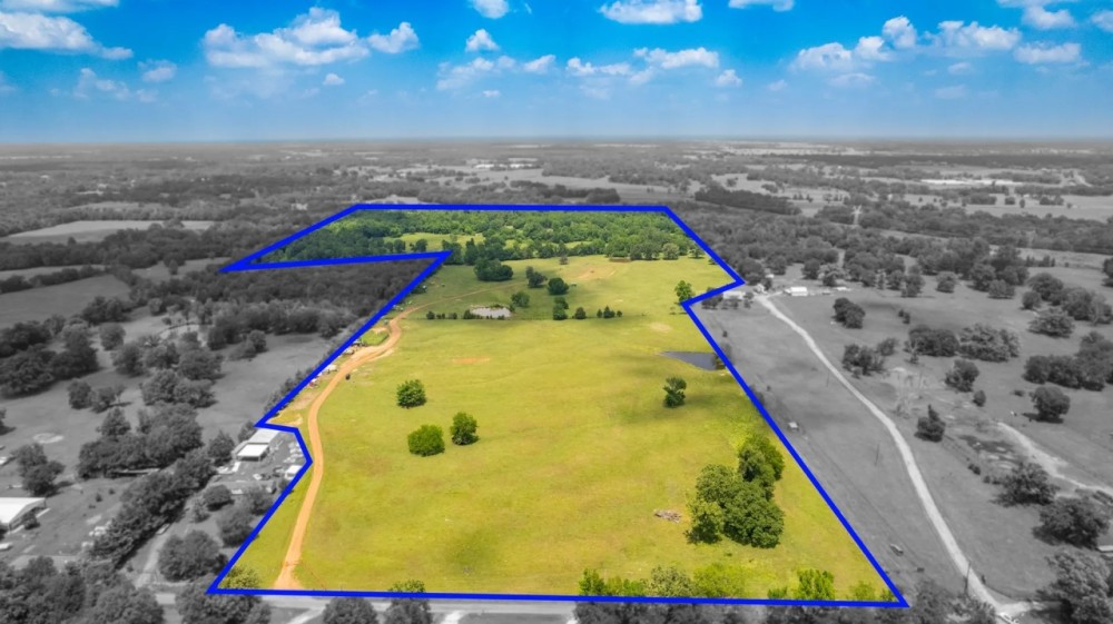 86 Acres North of Lowe s Distribution Center with Outbuildings Pond featured image