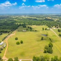 86 Acres North of Lowe s Distribution Center with Outbuildings Pond images 3