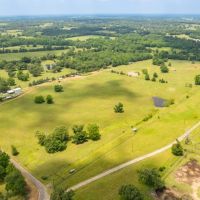 86 Acres North of Lowe s Distribution Center with Outbuildings Pond images 4