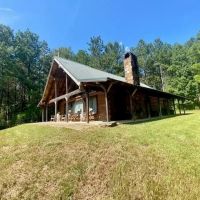 Secluded Log Cabin overloooking 5 ac Lake- 130 acres