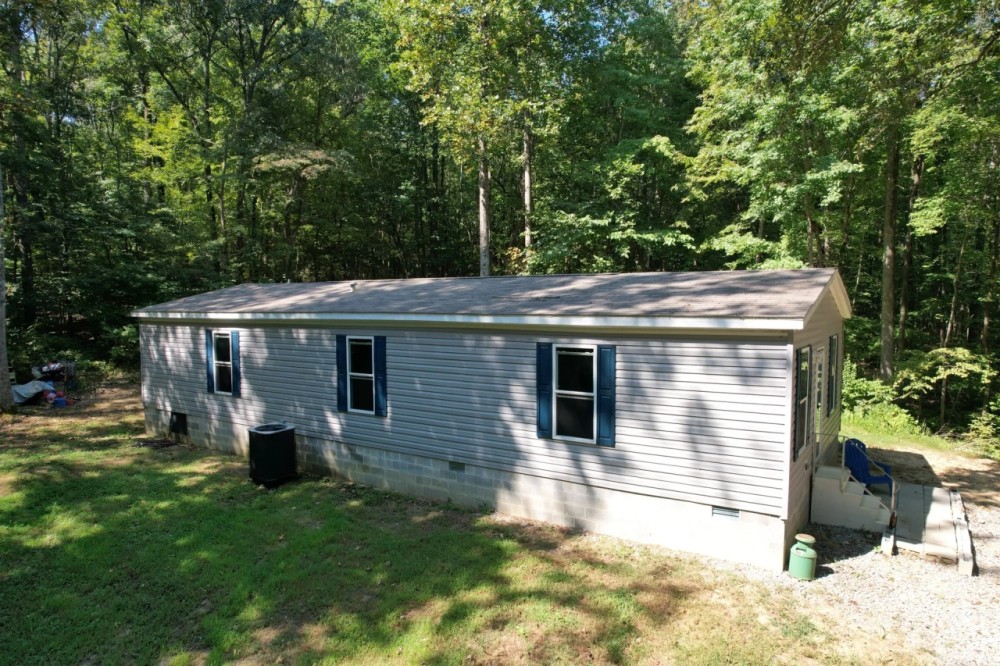 rural living and comfort in this 1344 sqft home sitting on 40 acres featured image