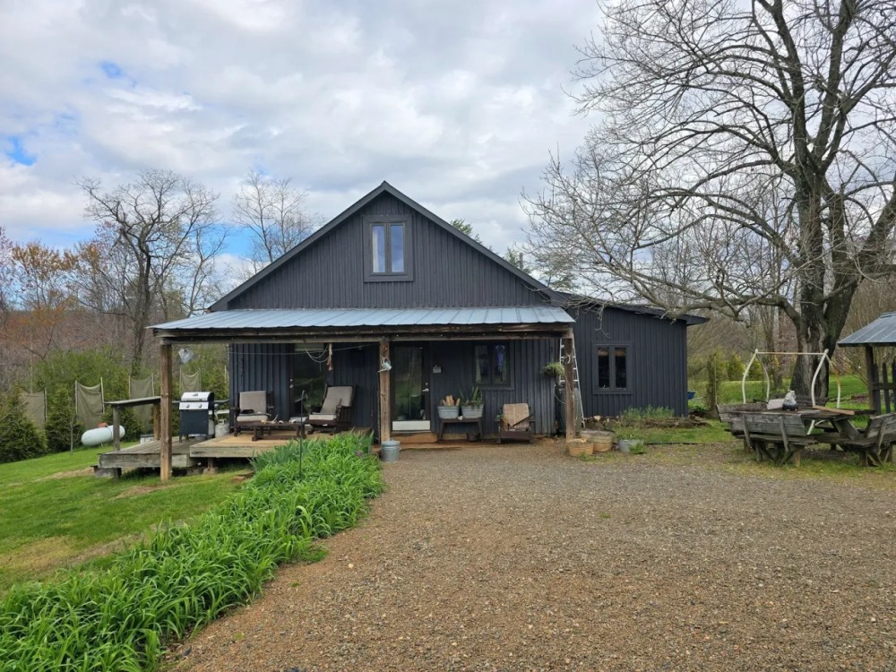 Mini Farm with 1955 Renovated home and Custom Survival Home on 51.45 Acres featured image
