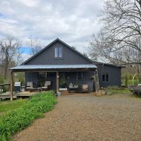 Mini Farm with 1955 Renovated home and Custom Survival Home on 51.45 Acres