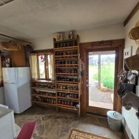 Mini Farm with 1955 Renovated home and Custom Survival Home on 51.45 Acres images 5