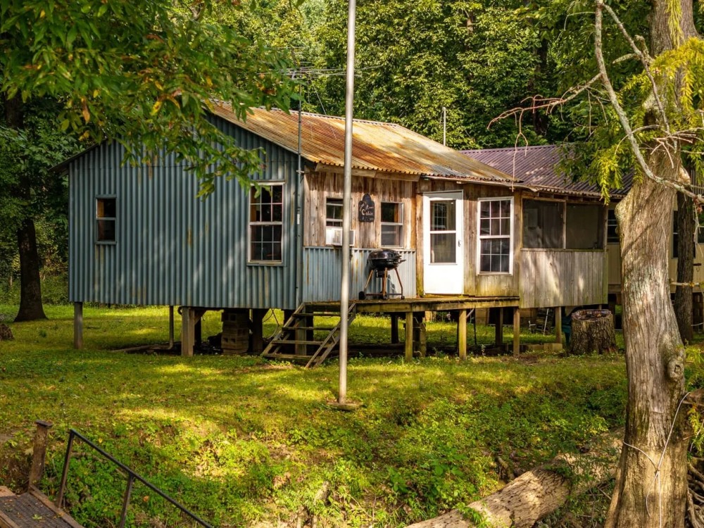 Cabin on Black River 2 Boat Docks 3 Lots and a Shared Boat Ramp Knobel