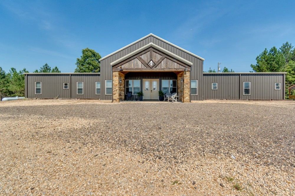 Brushy Creek Farm - Lodge overlooking 27 ac Lake on 844.9 acres featured image