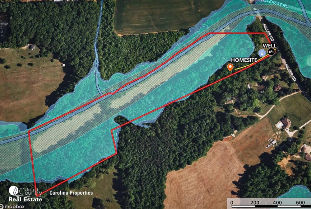 Land with Driveway Electric Well in West Rowan. Build Ready featured image