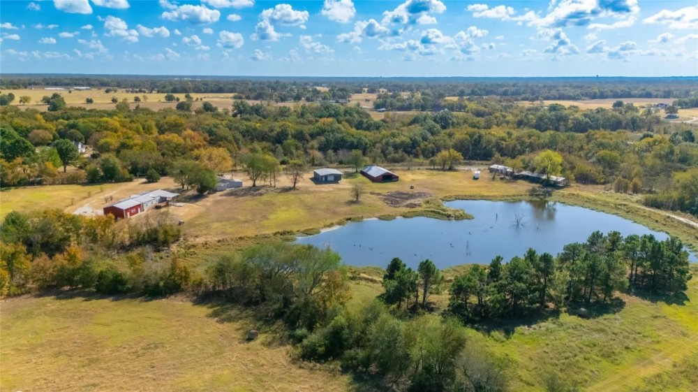 Rolling 128AC w Ag-Exemption 2 houses barns private lakes featured image