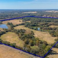 Rolling 128AC w Ag-Exemption 2 houses barns private lakes images 2