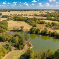 Rolling 128AC w Ag-Exemption 2 houses barns private lakes images 3