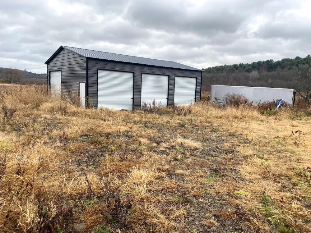 73 acres Hunting Land Travel Trailer and Shop with Fields and Streams in Wirt NY 3392 NY-275 featured image