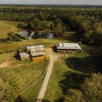 76.2 Acres with a Log Cabin Cypress Barn and Barndominium in Carroll County MS images 2