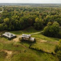 76.2 Acres with a Log Cabin Cypress Barn and Barndominium in Carroll County MS images 4
