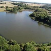40 Acre Paradise with a 6 Acre Stocked Pond