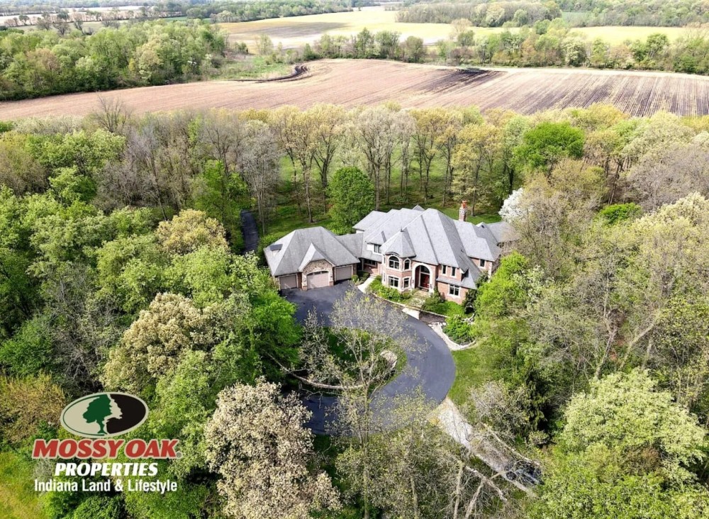 26201 Madison Rd North Liberty 90 - AC Luxury Living Tillable 8 687 sq ft Pool House pool 3 acre stocked pond featured image