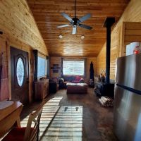 Comfort and adventure in this cozy lakefront cabin images 3